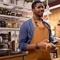 Partner cashier at a store counter